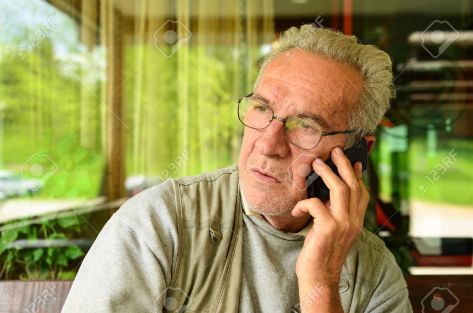 30549194-just-heard-the-bad-news-old-man-using-mobile-phone-stock-photo